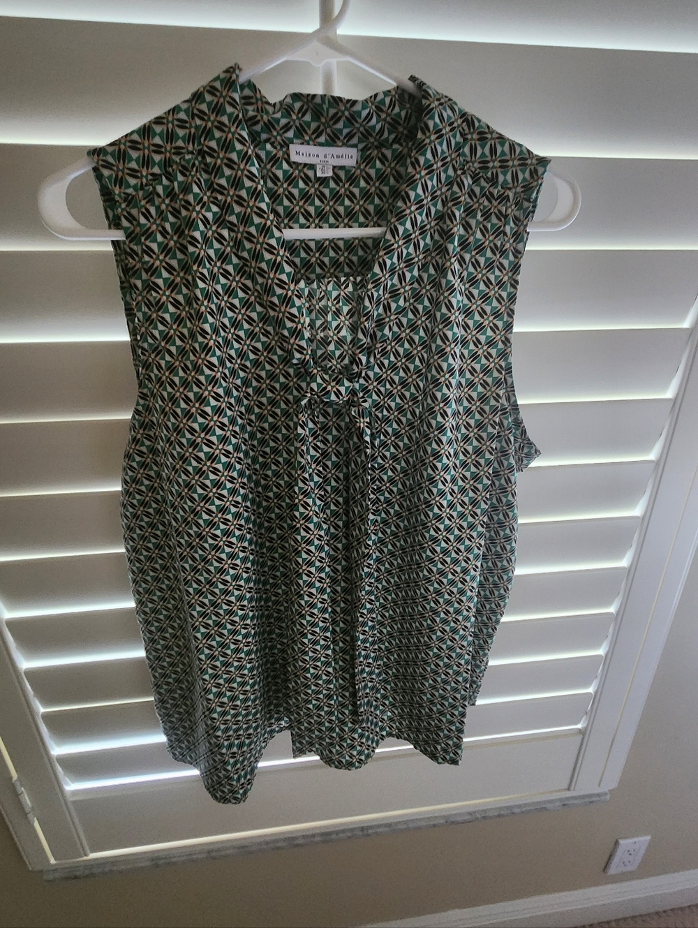 Sleeveless Tie-Neck Geometric Print Blouse in Black and Teal